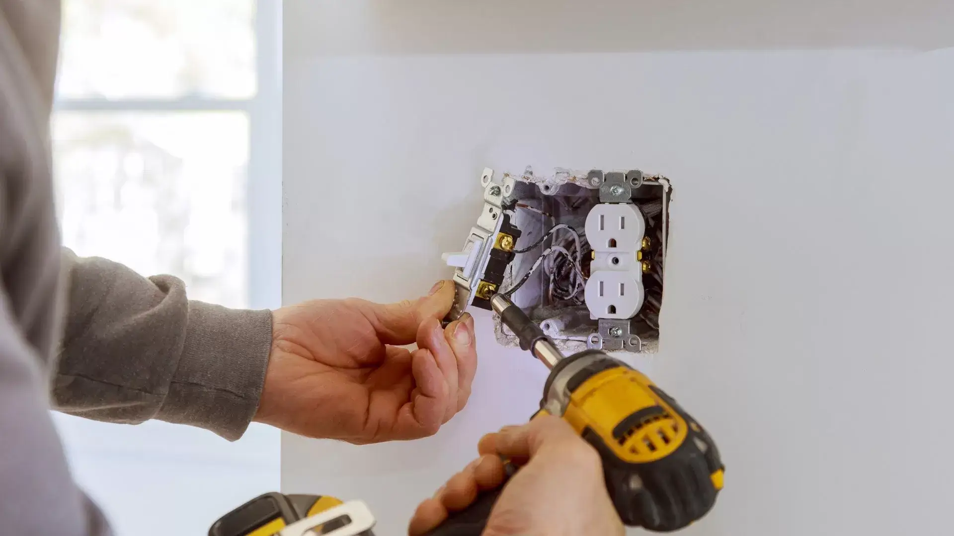 Installation and Replacement Services for Outlets and Plugs by Professional Electricians