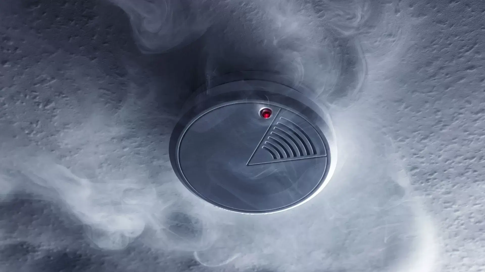 The operational aspects of smoke detectors, explained with the expertise of electricians.