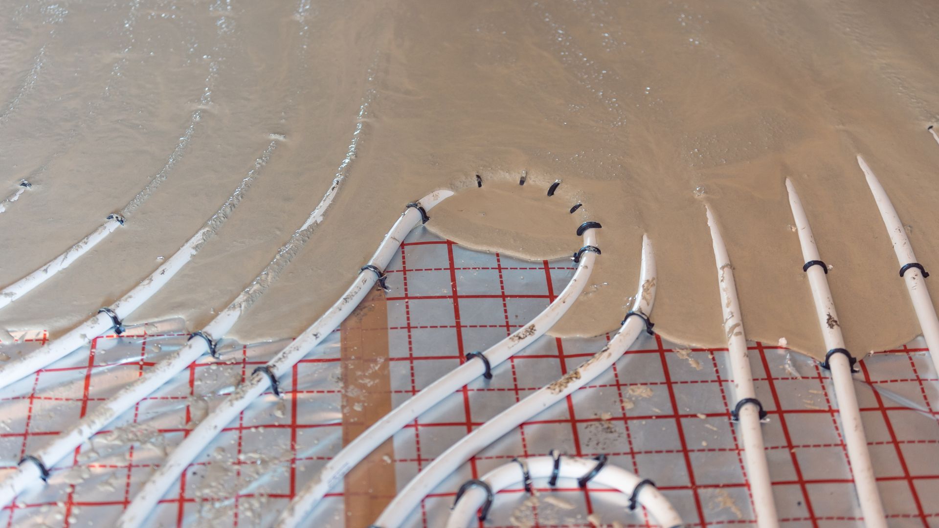 Electricians' Installation of Concrete Flooring for Radiant Heating